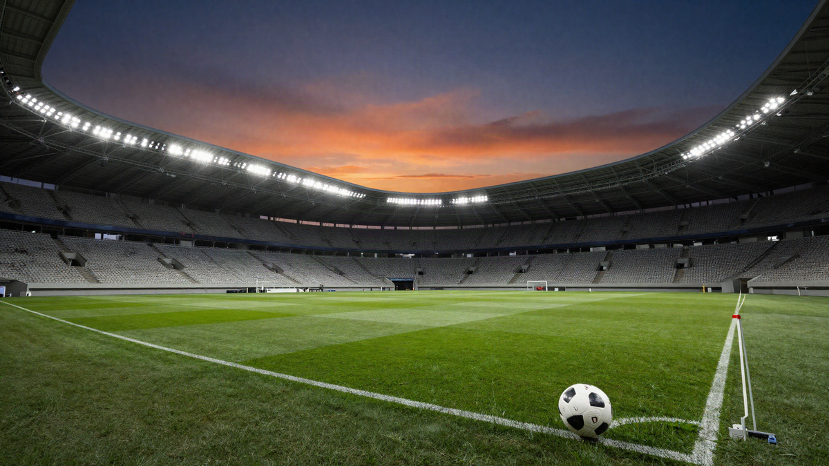 Stade de football éclairé au coucher du soleil